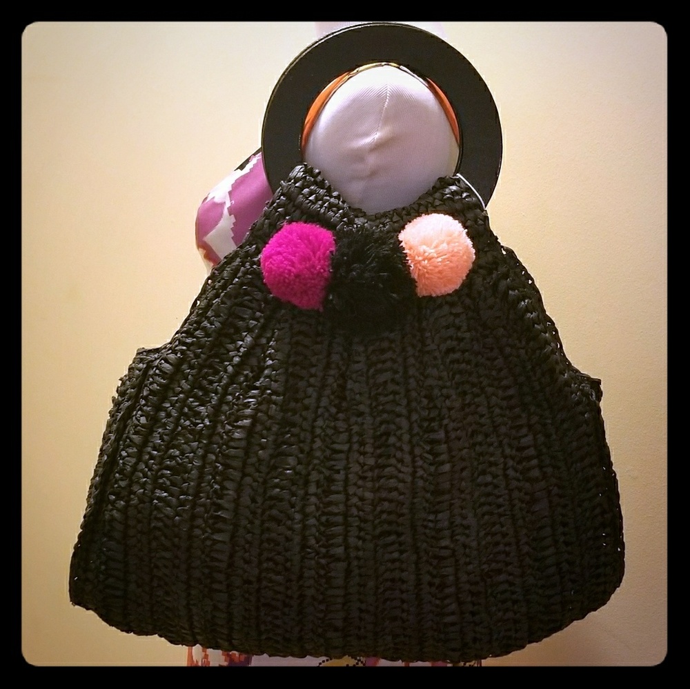 Black bag with wood handle
